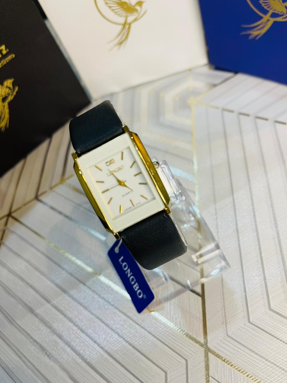 LONGBO female watch  Leather straps  With golden dial