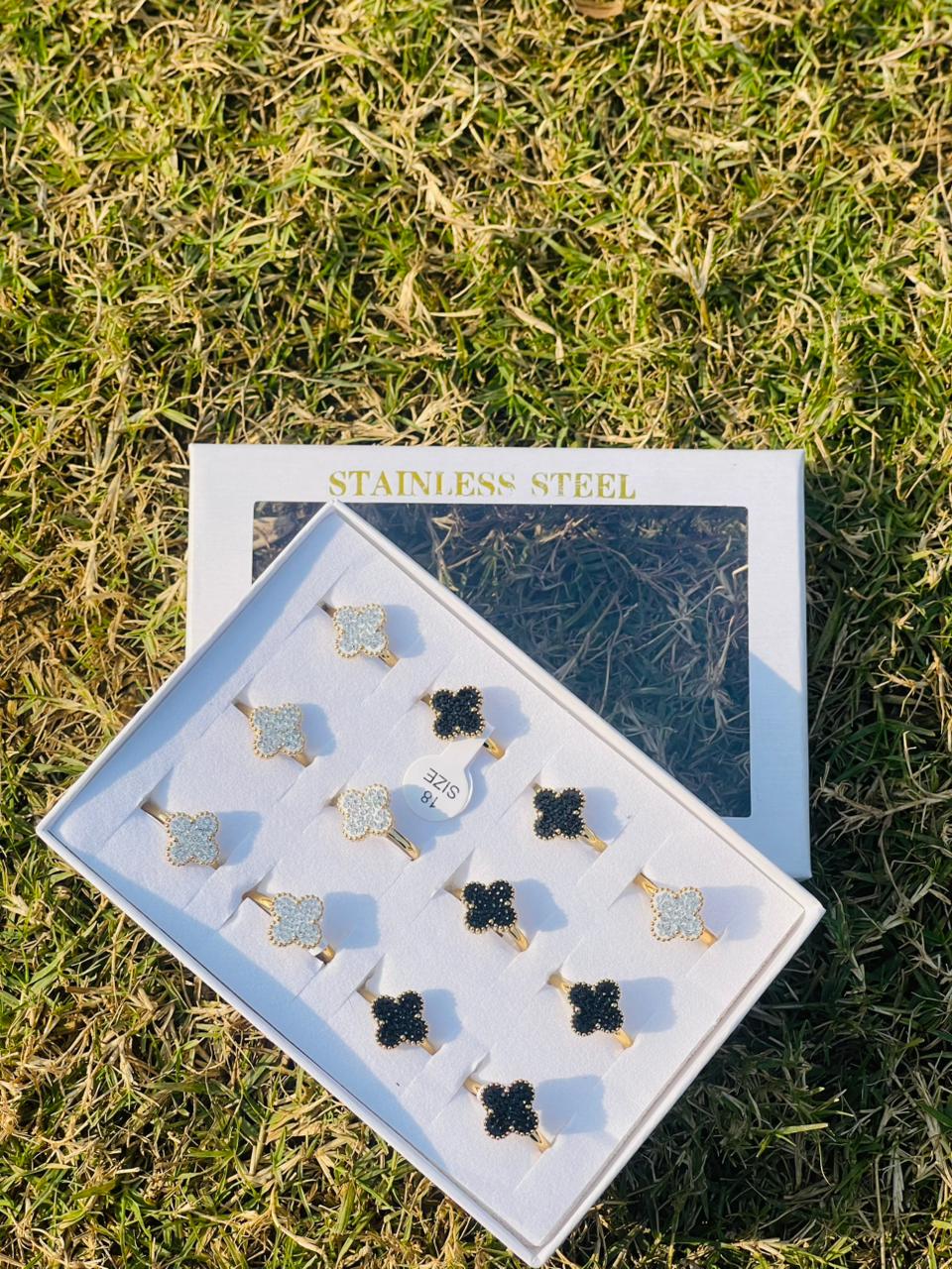 Black and White Crystal clover Rings